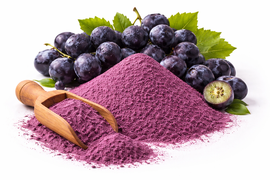 Pure black grapes powder made from dried Vitis vinifera fruit on white background
