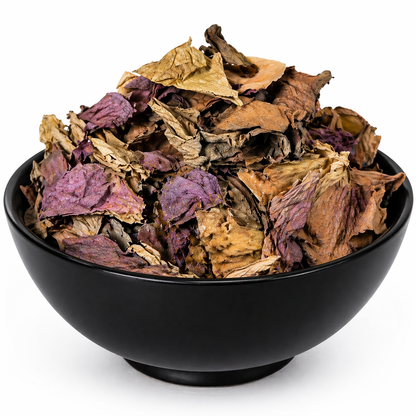 Blue Lotus Flower Cut dried petals in black bowl on white background