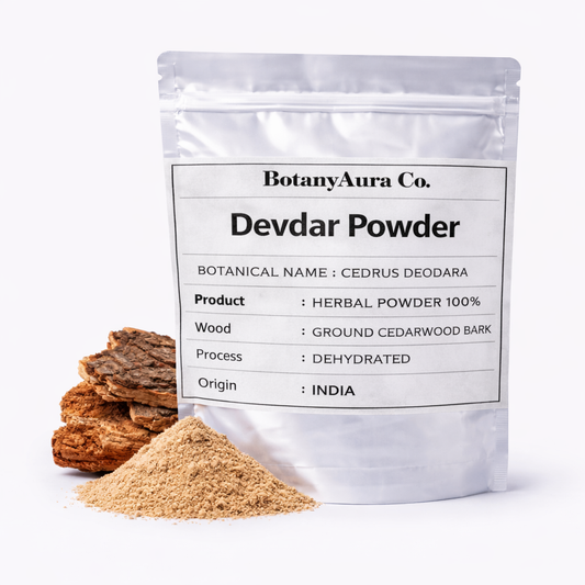 Devdar Powder in silver pouch with cedarwood bark and fine powder on clean white background