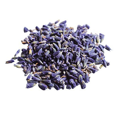 Pure dried lavender tea flowers on white background – caffeine free herbal tea